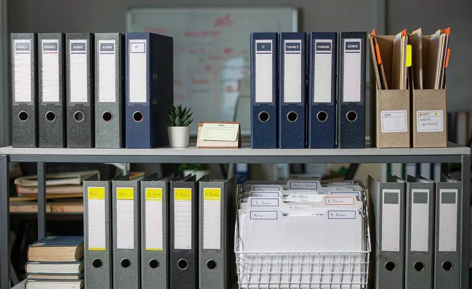 Organised staff documents in labelled folders